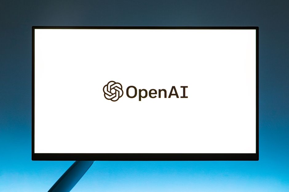 Minimalistic display of OpenAI logo on a gradient blue monitor, symbolizing the AI engines that generate brand citations.